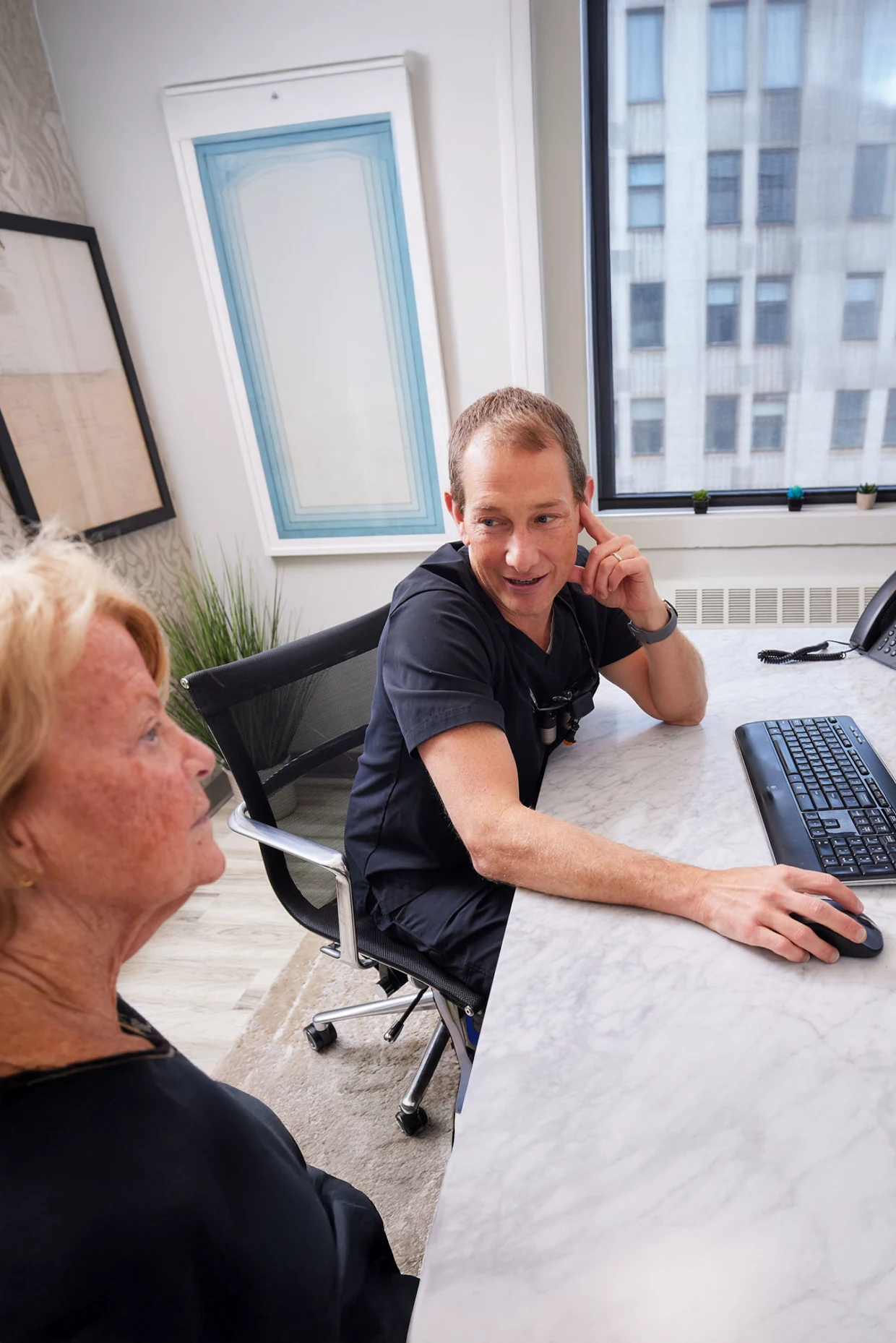 Dentist Chicago IL Dan Strobel Consulting With Patient Dentist Chicago IL Dan Strobel Consulting With Patient