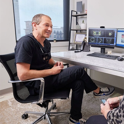 Dentist Chicago IL Dan Strobel Meeting With Patient