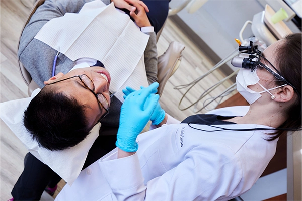 Dentist Chicago IL Isabella Terrassa With Patient