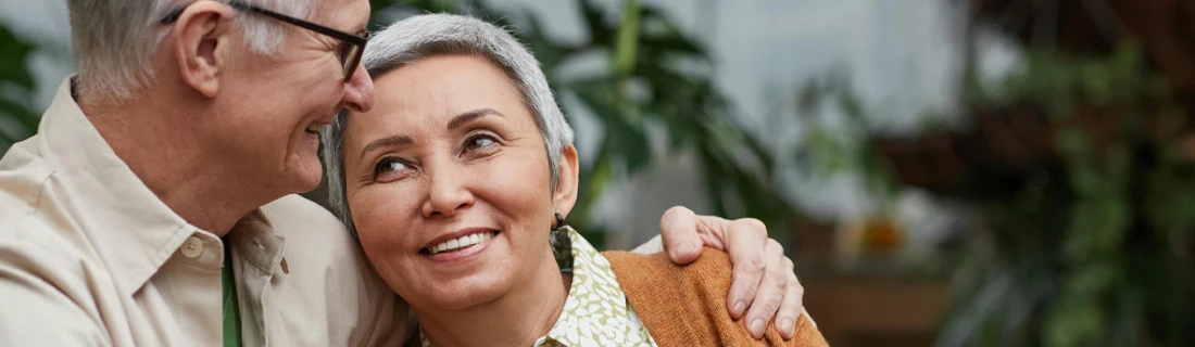 Dentist Chicago IL Older Couple Side Hug Outside Dentist Chicago IL Older Couple Side Hug Outside