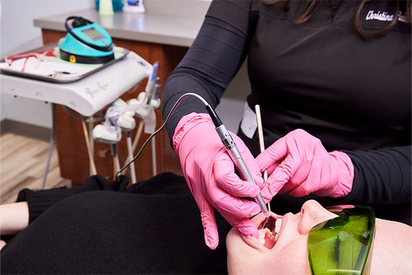 Dentist Chicago IL Patient Receiving Laser Dentistry